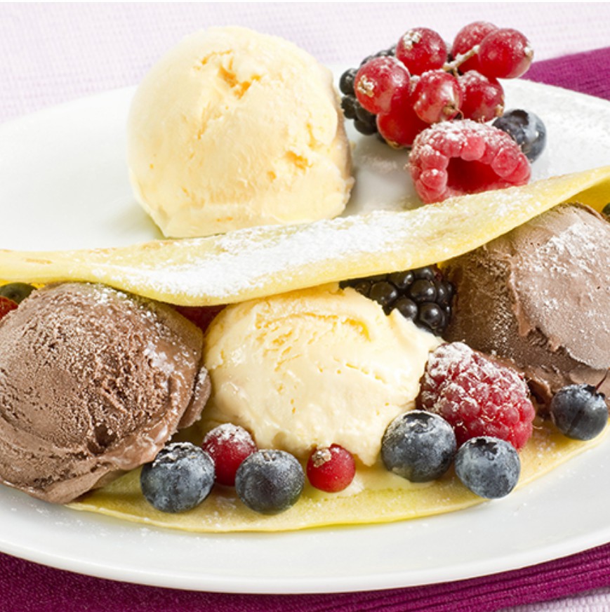 Crepes with ice-cream and berries